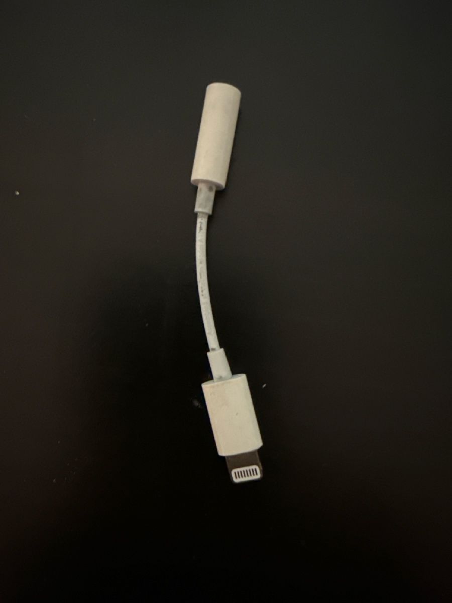 Apple Lightning to 3.5mm headphone adapter - good condition - Image 1